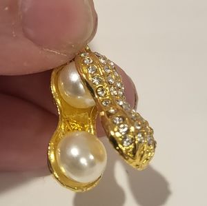 Peanut necklace. Peanut charm is in half w/ pearls as the nuts Crystal's outersh